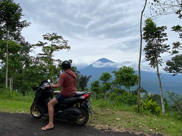 Riding a scooter in Bali Agung