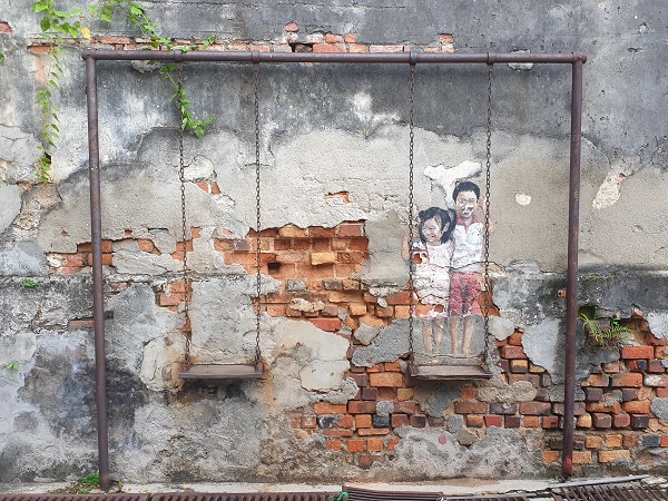 Brother and Sister on a Swing