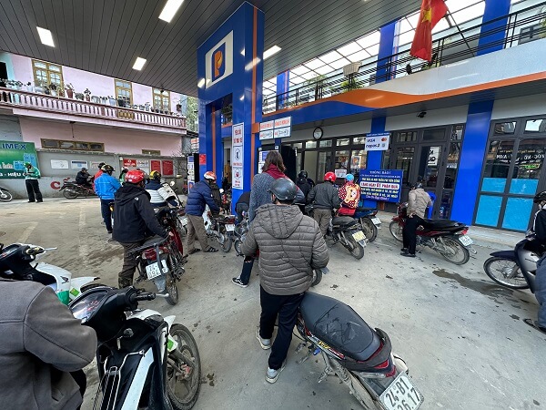 riding a scooter in sapa gas station
