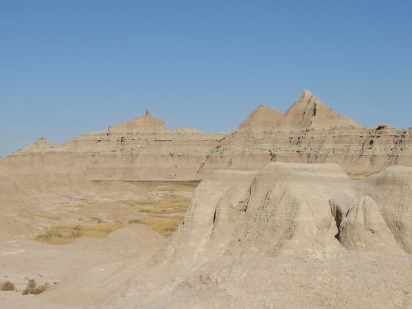 Badlands colors can range from brown and red to pinkish-tan depending on rock composition.