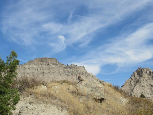 Hiking and camping the rugged Badlands National Park terrain are popular activities.